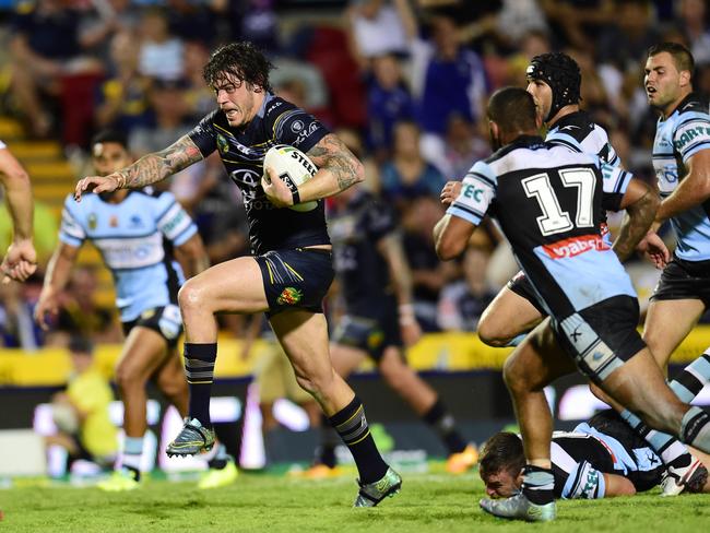 NRL Round 1 match between the NQ Cowboys and the Sharks in Townsville, QLD, at 1300 SMILES Stadium.Cowboy's Ethan Lowe sets up the game winning try. Picture: Wesley Monts