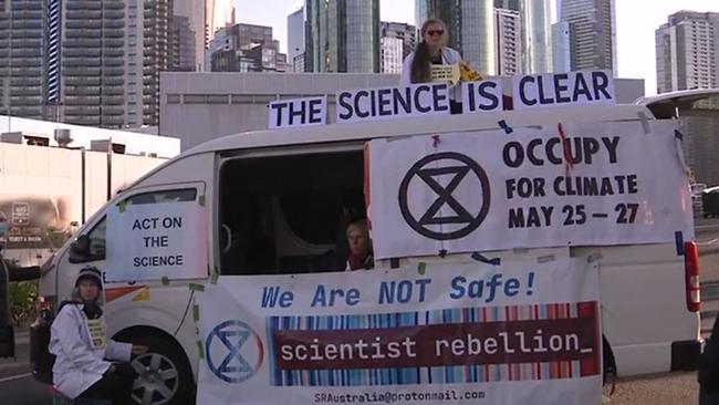 Climate activists blocked off the Kings Way inbound exit ramp from the West Gate Freeway at about 8.30am. Picture: 9NEWS