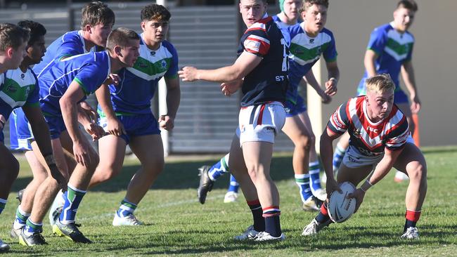 St Patrick Mackay's Baden Robinson with the ball