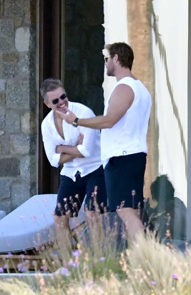 Matt Damon and Chris Hemsworth share a laugh in Mykonos. Picture: Backgrid