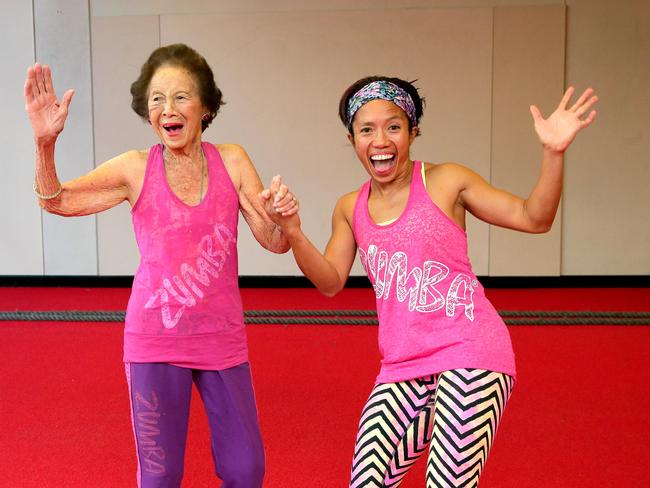 Dulcie struts her stuff with Zumba instructor Kathy Johnsun.