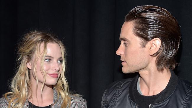 Margot Robbie hangs out with co-star Jared Leto at CinemaCon 2016.