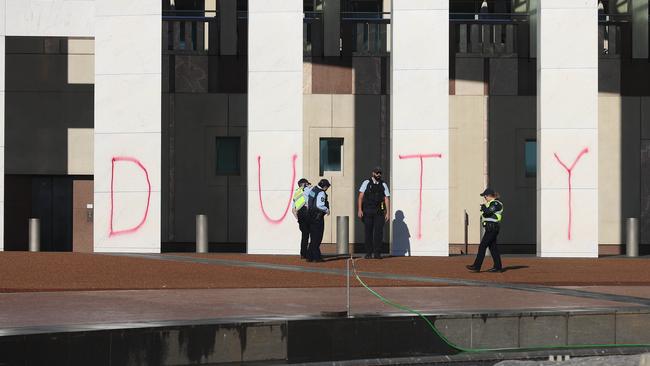 Graffiti by Extinction Rebellion protesters on the front of Parliament House, in Canberra. Picture: NCA NewsWire / Gary Ramage