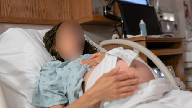 The man said his husband was "sweet as pie" to everyone in the room during her labour. Picture: iStock