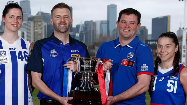 MELBOURNE, AUSTRALIA - JULY 15: (L-R) Jess Jones, Sarah King, Brett Gourley of the Kangaroos and Rhys Cahir, Dom Carbone of the Bulldogs pose during the 2024 rebel VFLW Grand Final media opportunity at ETU Stadium on July 15, 2024 in Melbourne, Australia. (Photo by Michael Willson/AFL Photos via Getty Images)