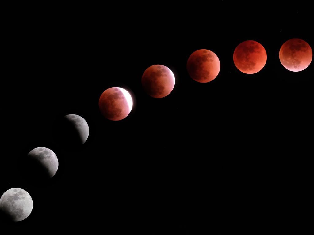 Composite image created on January 31, 2018 shows the moon during a lunar eclipse referred to as the “super blue blood moon” in Tokyo. Skywatchers were hoping for a rare lunar eclipse that combines three unusual events -- a blue moon, a super moon and a total eclipse -- which was to make for a large crimson moon viewable in many corners of the globe. Picture: AFP