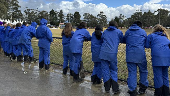 Students from the Alpine School support their teacher Tom Barr, playing for Warburton Millgrove.