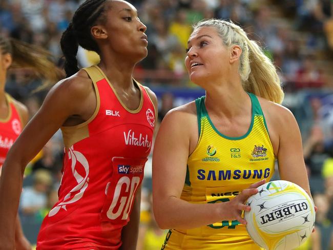 NEWCASTLE, AUSTRALIA - SEPTEMBER 19:  Gretel Tippett of the Diamonds takes control of the ball during the Quad Series International Netball test match between the Australian Diamonds and the England Roses at Newcastle Entertainment Centre on September 19, 2018 in Newcastle, Australia.  (Photo by Tony Feder/Getty Images)