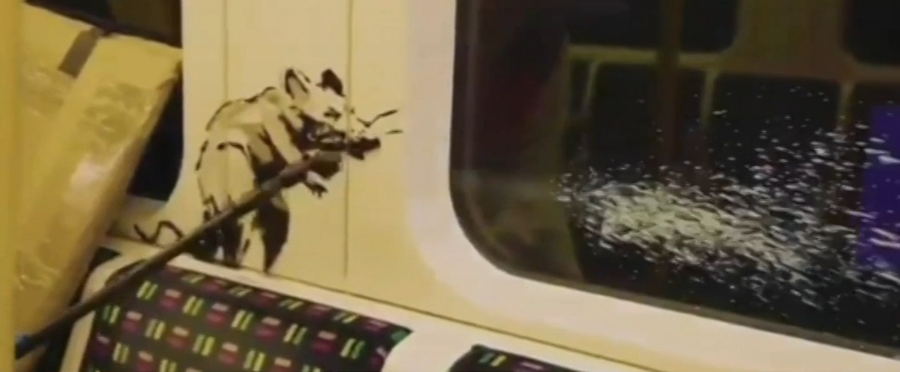 Banksy encourages commuters to wear masks with latest artwork