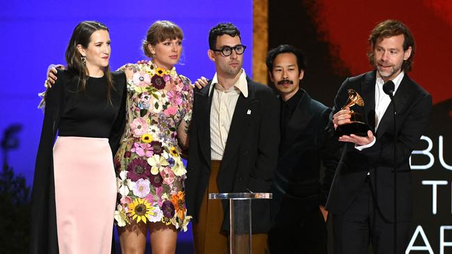 L-R: Laura Sisk, Taylor Swift, Jack Antonoff, Jonathan Low and Aaron Dessner accept the Album of the Year award for folklore. Picture: AFP