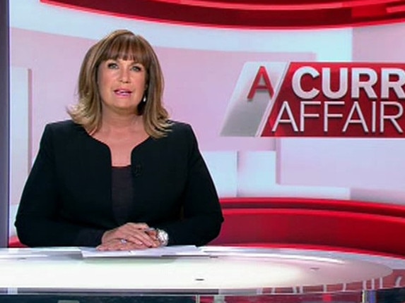 Tracy Grimshaw pictured at the A Current Affair desk. ACA, screenshot.