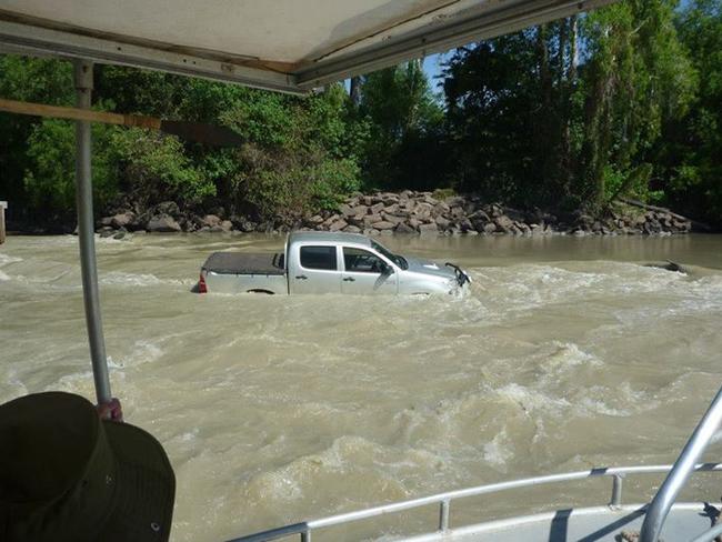 A woman was lucky to survive after her ute became trapped in the croc-infested East Alligator River at Cahills Crossing in June 2014. A chance turn of events led to her rescue by a tour boat operator.