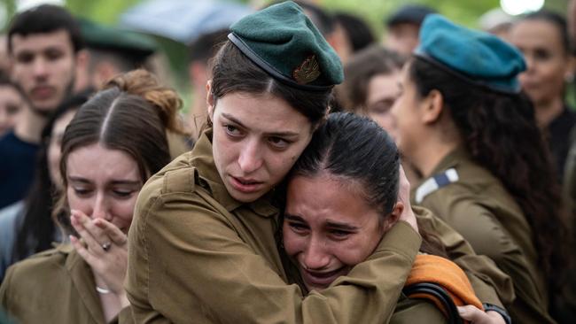 Israeli soldiers attend the funeral of a fellow soldier in a military cemetery in Jerusalem. Picture: AFP