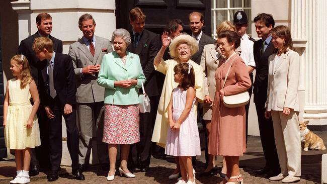 Beatrice and Eugenie with the Queen, the Queen Mother and other relatives in 1998. Picture: Supplied