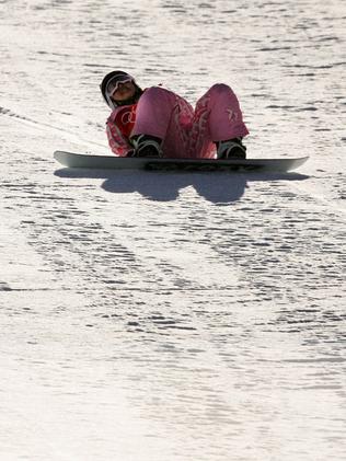 Melo Imai sits on the snow after falling. (Photo by Adam Pretty/Getty Images)