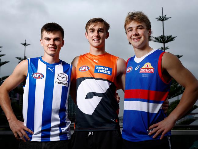 Tasmanians Colby McKercher, James Leake and Ryley Sanders after they were drafted. (Photo by Michael Willson/AFL Photos via Getty Images)