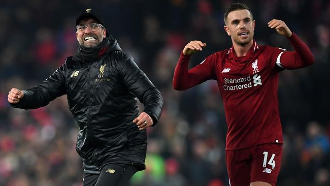 Liverpool's German manager Jurgen Klopp celebrates with midfielder Jordan Henderson after the win over Crystal Palace. Picture: AFP