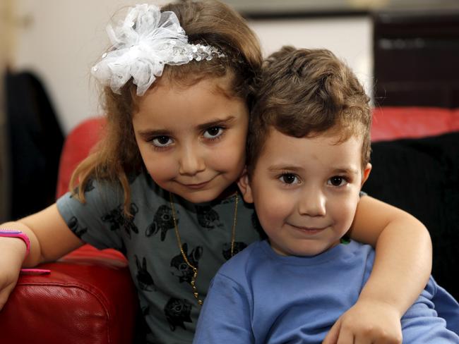 At the centre of all the drama are these two beautiful children, Lahela and Noah. Picture: Mohamed Azakir/Reuters.