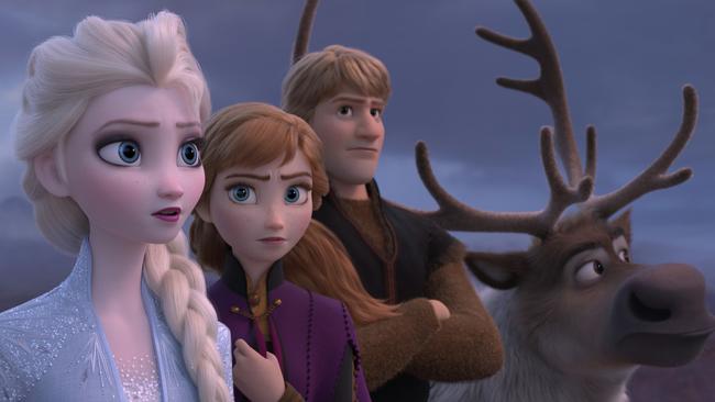 This image released by Disney shows Elsa, voiced by Idina Menzel, from left, Anna, voiced by Kristen Bell, Kristoff, voiced by Jonathan Groff and Sven in a scene from the animated film, "Frozen 2." (Disney via AP)