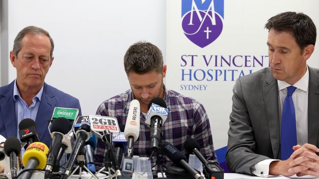 Australian team doctor Peter Brukner, captain Michael Clarke and chief executive James Sutherland address the press following Phillip Hughes’ passing at St Vincents Hospital.