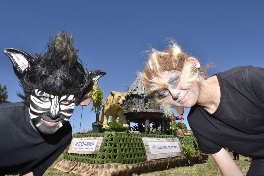 Heath Michael (left) and Reid Crossinggum get in touch with their inner animal. Picture: Bev Lacey