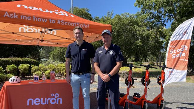 Neuron Mobility regional manager for Queensland Tim Morris and Rockhampton Highway Patrol Officer in Charge Senior Sergeant Ewan Findlater are encouraging locals to scoot safe on E-Scooters these school holidays.