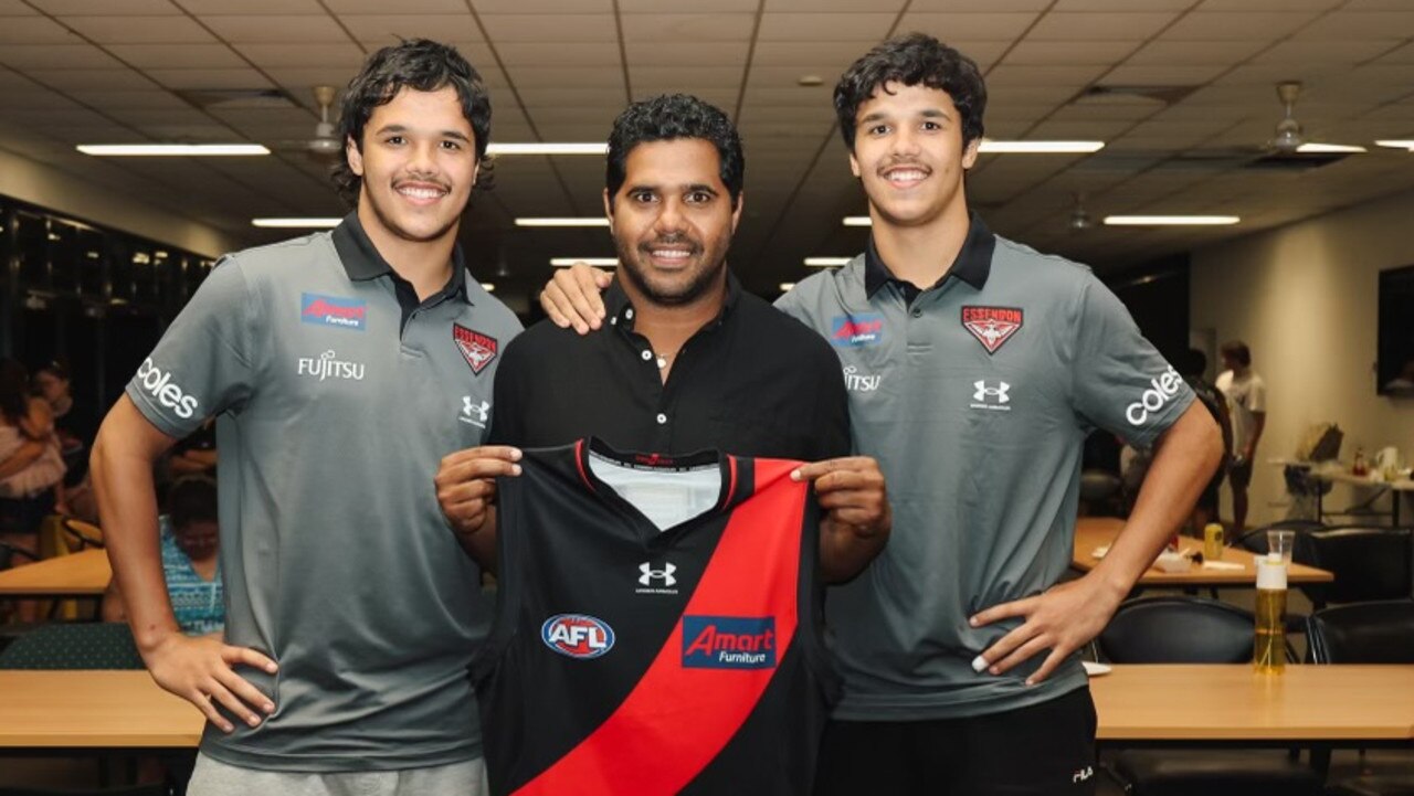 Jayden Davey, Alwyn Davey Sr and Alwyn Davey Jr. The father-son twins came as bargain buys after no club bid in the first 44 selections. Alwyn Jr reminded some of Tiger great Shane Edwards. (Picture: Essendon Football Club)