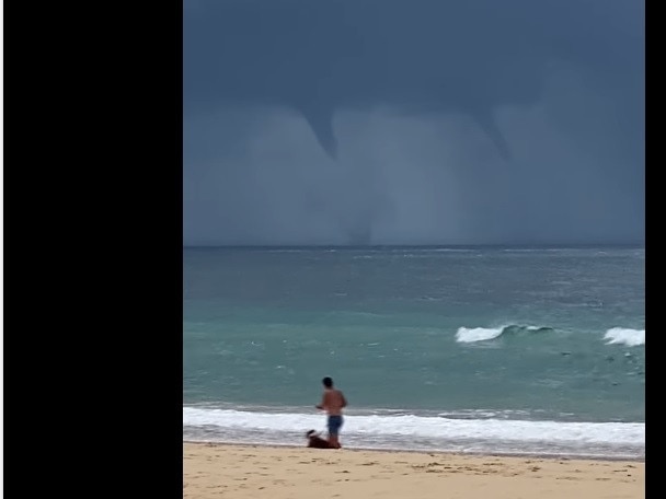 Twin Water spouts captured on film off Rainbow Beach on March 30, 2021