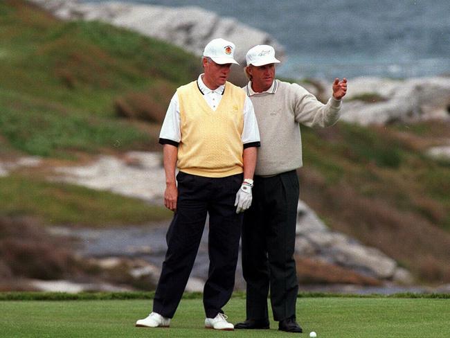 Former US President takes advice from professional golfer Greg Norman in 1996.