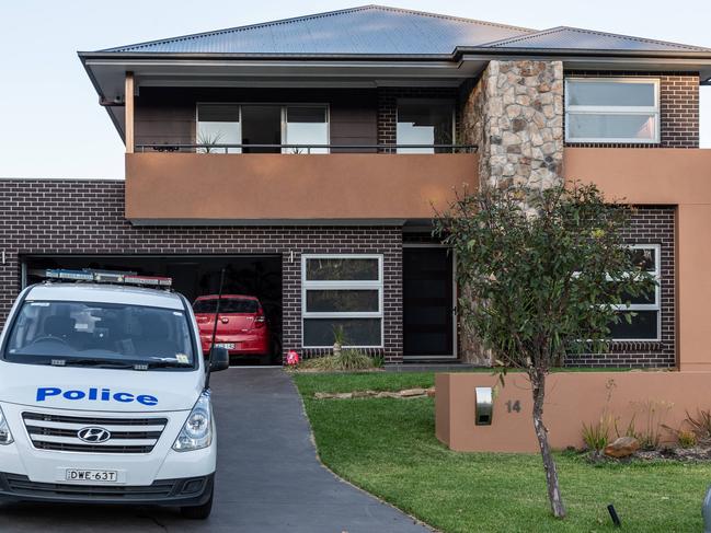 Police pictured outside Johan Schwart’s home. Picture: Monique Harmer