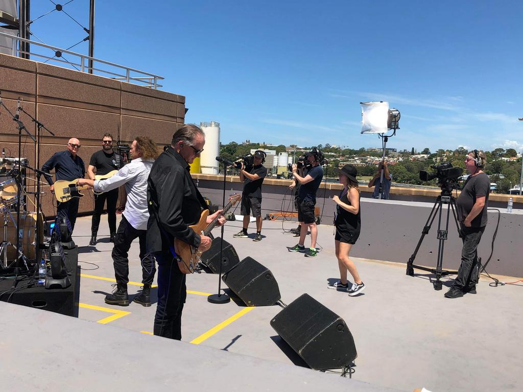 Australian rock band The Angels performed on the Channel 10 roof during Studio 10. Picture: Maurice Parker