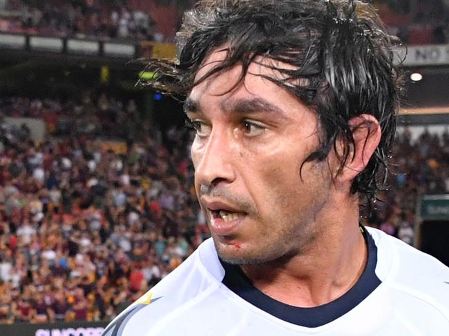 Johnathan Thurston of the Cowboys reacts after losing the Round 2 NRL match between the Brisbane Broncos and the North Queensland Cowboys at Suncorp Stadium in Brisbane, Friday, March 16, 2018. (AAP Image/Darren England) NO ARCHIVING, EDITORIAL USE ONLY