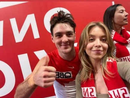 Errol Gulden with American actress Sydney Sweeney during the Round 2 AFL match between the Sydney Swans and Hawthorn Hawks at the SCG on March 26, 2023.