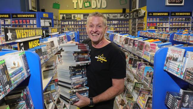 David Hooklyn has more than 20,000 DVDs as his Runaway Bay video store, That's Rentertainment. Picture: Glenn Hampson