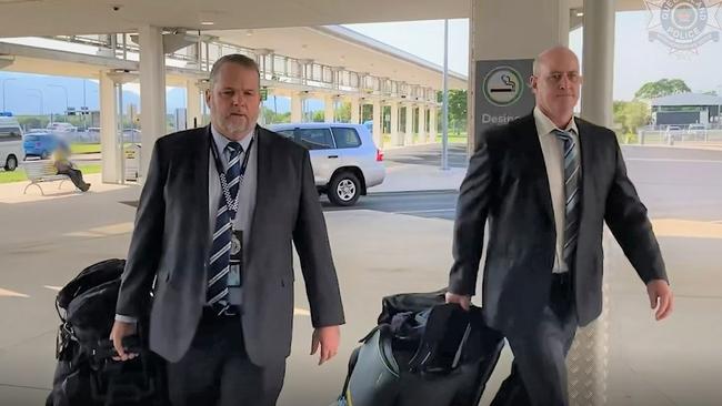 Detective Inspector Kevin Goan of the Far North crime division and Detective Sergeant Gary Hall depart Cairns for India. Picture: Queensland Police