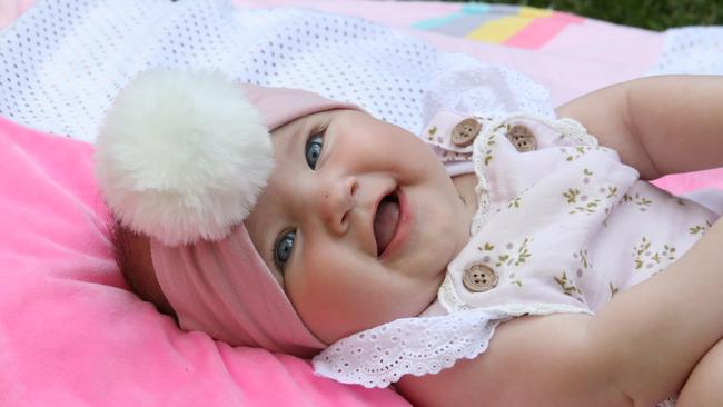 Ava Mia Richards from Varsity Lakes won the cutest smile competition. Picture: Glenn Hampson.