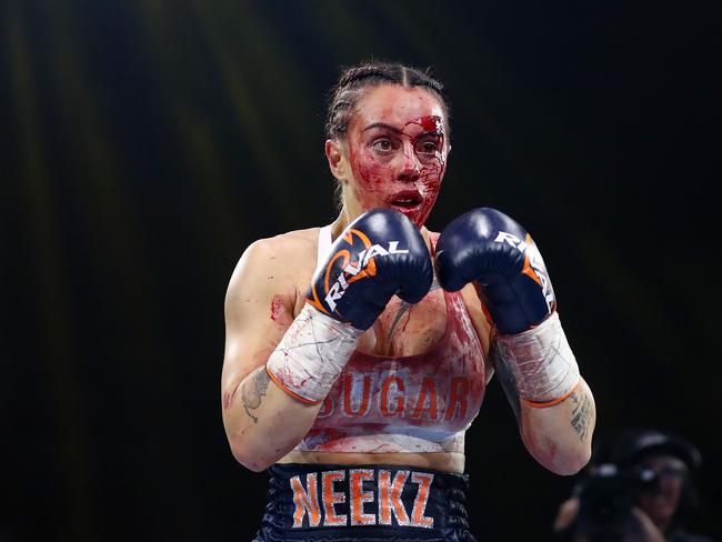 MELBOURNE, AUSTRALIA - OCTOBER 16:  Cherneka Johnson  and in action in her fight against Susie Ramadan in the undercard fight before the World Lightweight Championship bout between George Kambosos Jr. of Australia and Devin Haney of the United States at Rod Laver Arena on October 16, 2022 in Melbourne, Australia. (Photo by Kelly Defina/Getty Images)