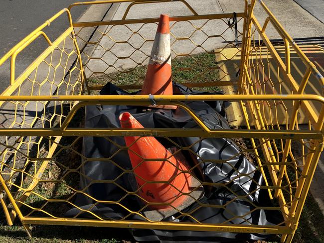 Telecom pits at Marco Ave, Panania, which are being replaced for the NBN rollout. Some of the pits contain asbestos. Picture: Lawrence Machado