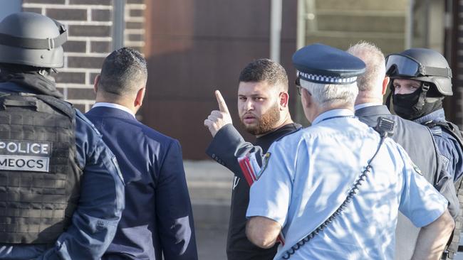 Police raid a Greenacre home and arrest Muhammad Khodar Ali Ahmed. Picture: Jenny Evans