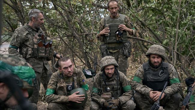 Ukraine soldiers resting in the bushes near the frontline on September 19, in Pokrovsk region, Ukraine. Picture: Kostiantyn Liberov/Libkos/Getty Images