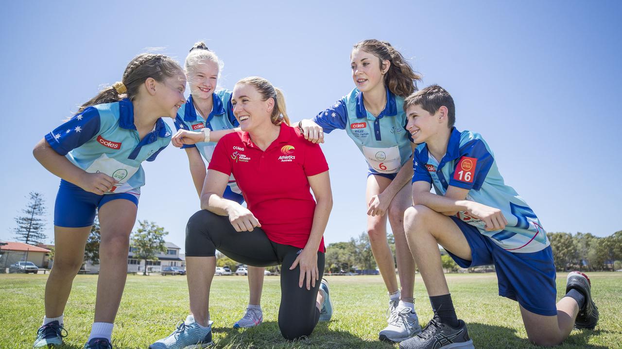 Meleah Hackett, 8, Lauren Heath 15, Alex Epitropakis 14 and Rylee O’Shaughnessy, 15 with Pearson at the Algester Little Athletics. Picture: Peter Wallis