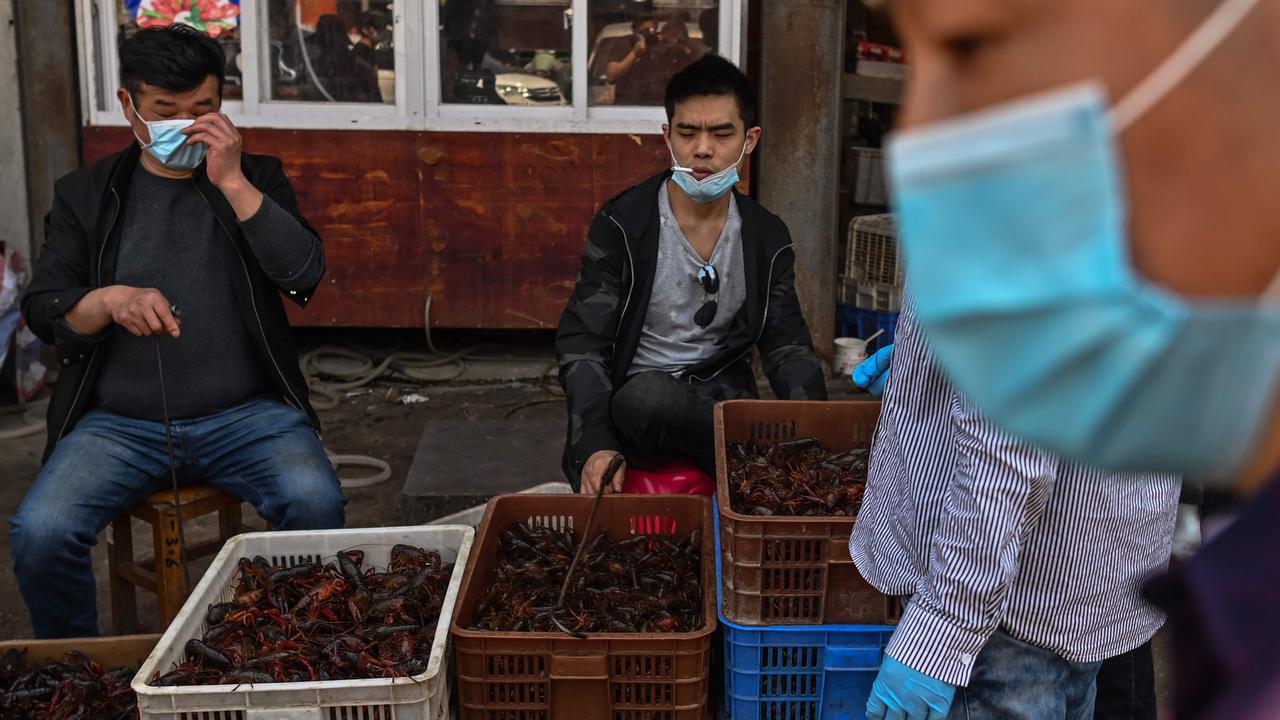 WHO made the decision not to close wet markets globally because they’re critical to providing food and livelihoods for millions of people. Picture: Hector Retamal/AFP