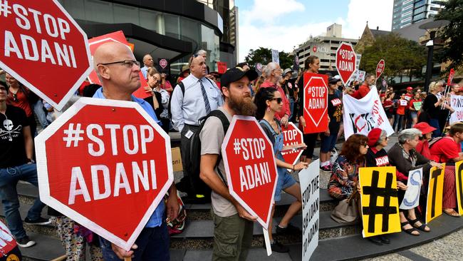 Protestors against the Adani coal mine rally outside Adani's headquarters in Brisbane, October 20, 2017. Photo: AAP Image/Darren England