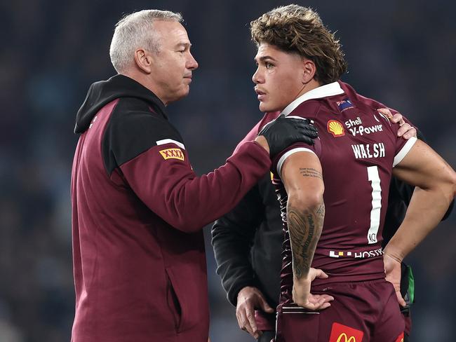 Reece Walsh of the Maroons is attended to by medical staff after been tackled by Joseph-Aukuso Sua'ali'i. Picture: Getty Images