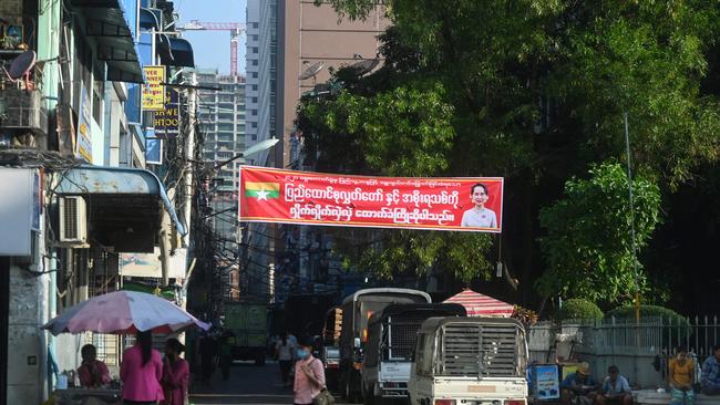 A banner supporting Aung San Suu Kyi on a street in Yangon today. Picture: AFP