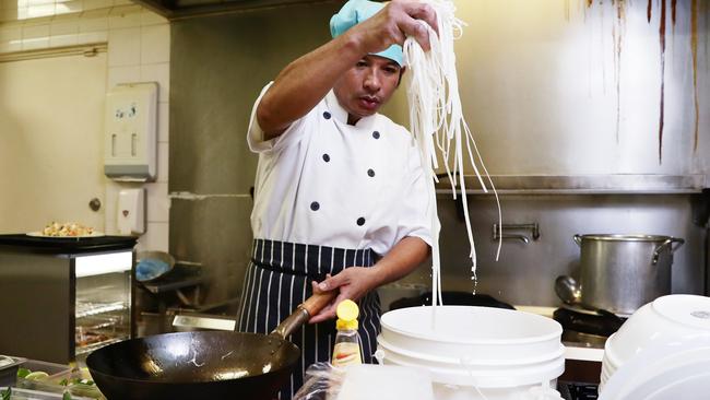 The Best Soup, Best Food restaurant has just opened at the southern end of Lake Street in the Cairns CBD. Owner and chef Kyaw Nyein Chan makes a Kaw Tayout stir fry with chicken. Picture: Brendan Radke