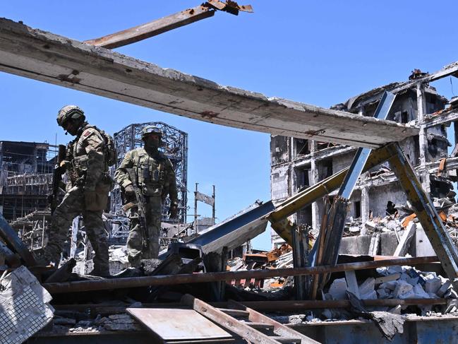 Russian servicemen patrol a territory of the Azovstal steel plant in Mariupol, amid the ongoing Russian military action in Ukraine, on June 13, 2022. Picture: Yuri Kadobnov / AFP.