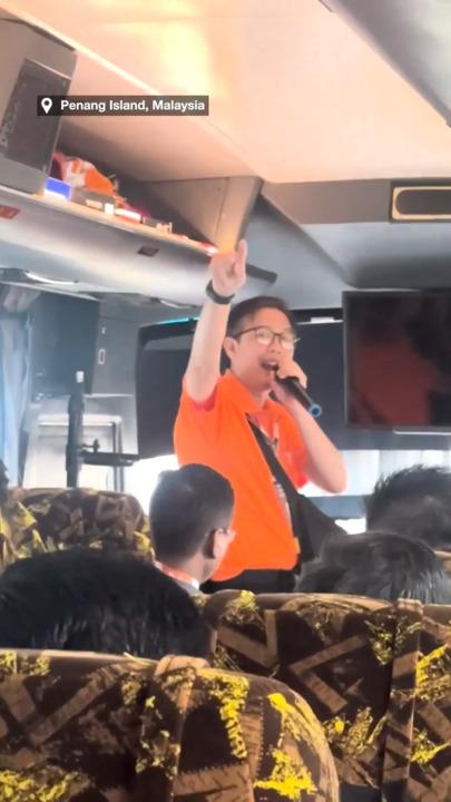 Bus full of tourists unimpressed with singing tour guide