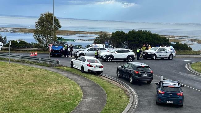 Motorists faced traffic delays after a crash on Phillip Island Rd, just before the San Remo Bridge, where a car rolled and landed upside down and put two people in hospital on Wednesday afternoon. Picture: Facebook/Ellen Jayne