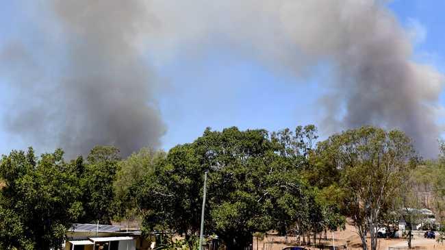 BUSHFIRE BATTLE: Fire crews are working hard to contain a bushfire burning in Milman, North Rockhampton.